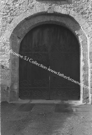 LISMORE CASTLE  ENTRANCE TO COURTYARD WITH CELTIC CARVINGS